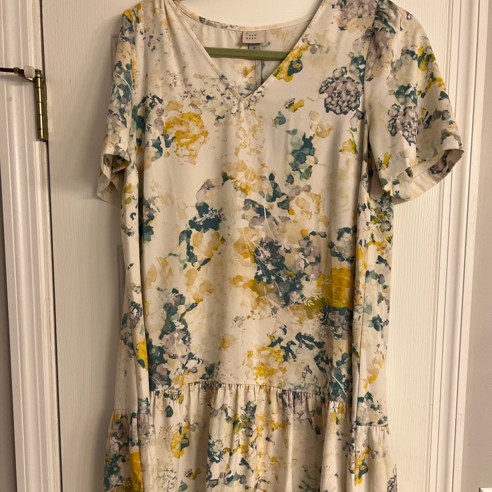 Size small, cream, yellow and greenish blue